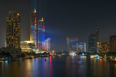 Illuminated buildings in city at night