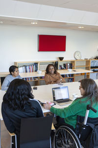 Disabled woman during meeting in office