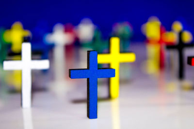 Close-up of cross at cemetery