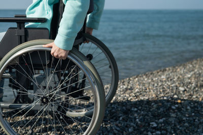 Low section of man riding bicycle