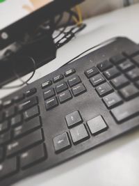 Close-up of computer keyboard on table