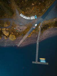 High angle view of airplane flying over sea