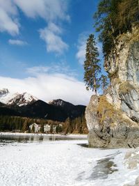 Scenic view of landscape against sky during winter