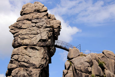 Low angle view of statue against sky