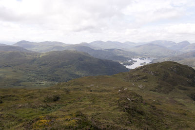 View of south kerry mountains and killarney's upper lake from the summit of torc mountain