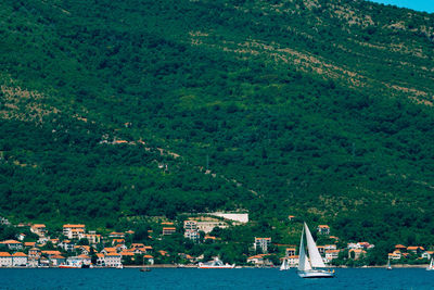 Scenic view of sea and buildings