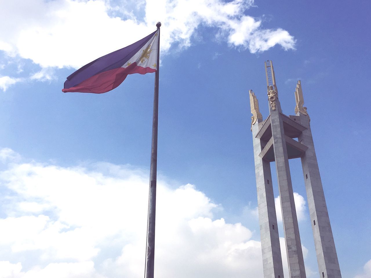 LOW ANGLE VIEW OF FLAG AGAINST SKY