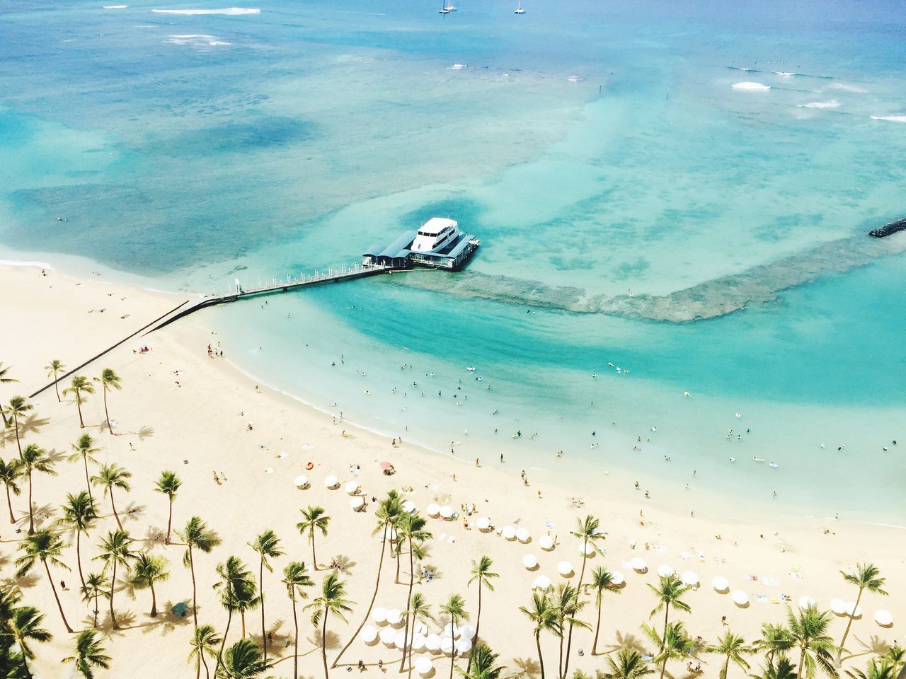 beach, sea, water, sand, shore, high angle view, vacations, horizon over water, tranquility, beauty in nature, scenics, tranquil scene, nature, coastline, incidental people, tourism, summer, blue, day