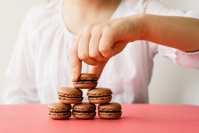 Close-up of hand holding cookies