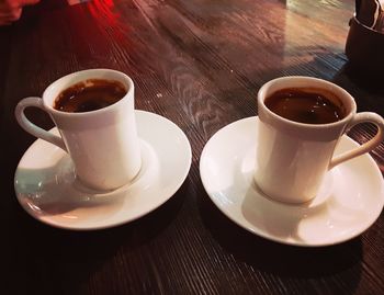 Close-up of coffee cup on table