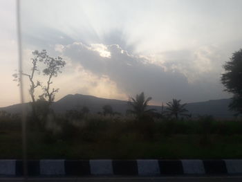 Scenic view of silhouette mountain against sky during sunset