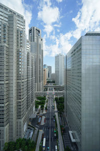 Modern buildings in city against sky