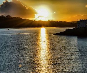 Scenic view of sea at sunset