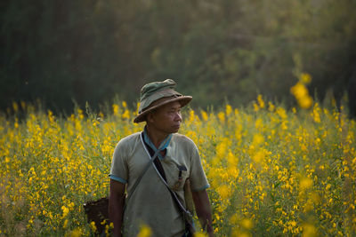 Farmer in yellow farm