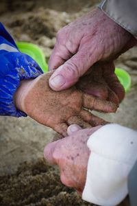 High angle view of man holding hands