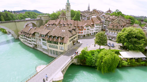 Panoramic view of buildings and bridge in city