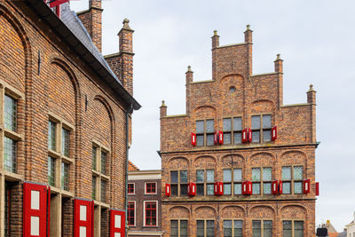 Low angle view of buildings against sky