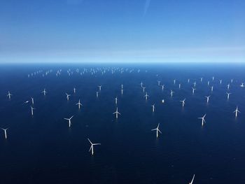 High angle view of wind turbines in the sea