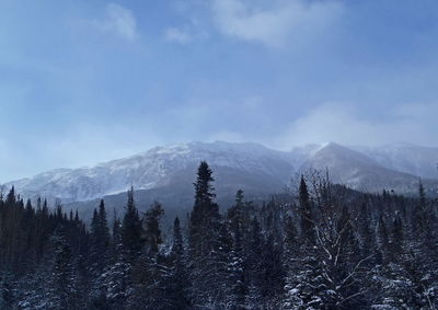 Scenic view of mountains against sky during winter
