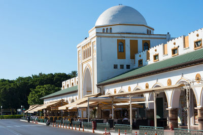 Rhodes town market building on a sunny day, nea agora, mandraki harbour, city of rhodes, greece