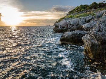 Scenic view of sea against sky during sunset