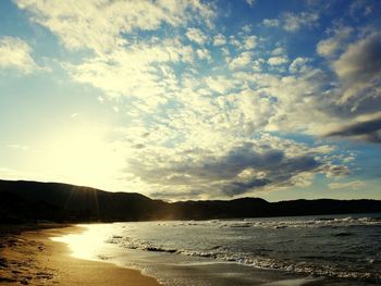 Scenic view of landscape against sky during sunset