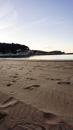 Scenic view of beach against sky