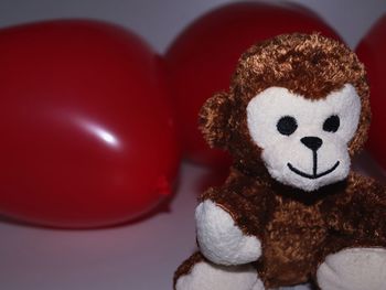 Close-up of stuffed toy against gray background