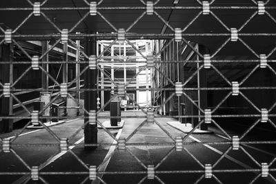 View of chainlink fence at night