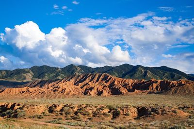 Scenic view of rocky mountains against sky