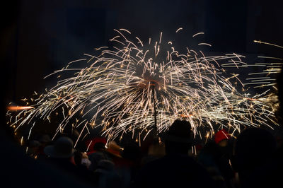 Firework display at night