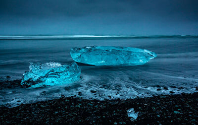 Diamonds stranded on the black beach