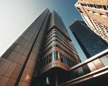 Low angle view of modern building against clear sky