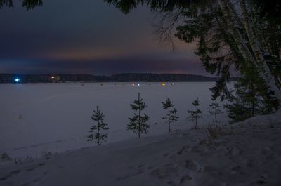 Scenic view of beach against sky during sunset