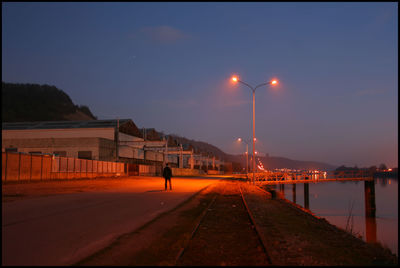 Illuminated street lights at night