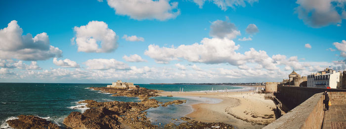 Panoramic view of beach against sky