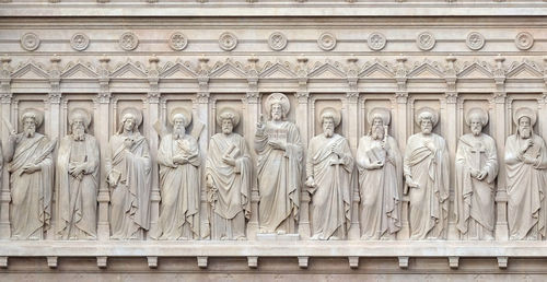 Jesus christ with apostles, facade of saint augustine church in paris, france