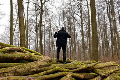 Rear view of man in forest