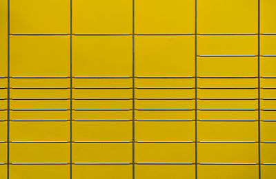 Full frame shot of yellow packing station 