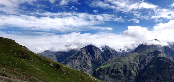 Panoramic view of mountains against sky