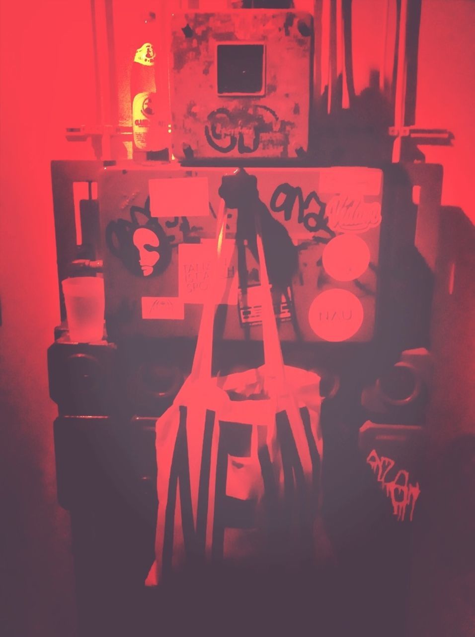 indoors, red, table, still life, close-up, home interior, chair, drink, restaurant, illuminated, candle, arts culture and entertainment, no people, technology, communication, food and drink, music, bottle, wood - material, absence