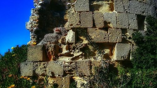 Low angle view of damaged building