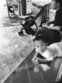 Portrait of father with daughter in car