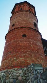 Low angle view of old building against sky