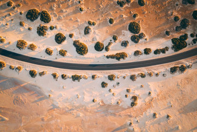 Aerial view of road amidst desert