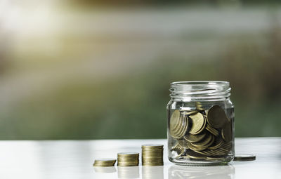 Close-up of glass jar on table