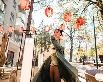 Rear view of woman with umbrella