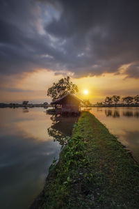 Scenic view of amazing sunset view from a rice field area with a hut and very beautiful sky