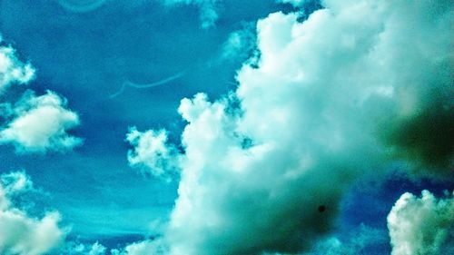 Low angle view of clouds in blue sky