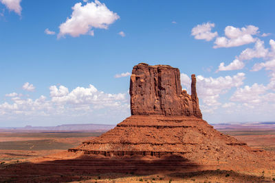 Rock formations on landscape against sky